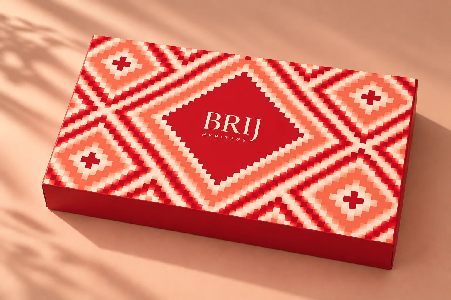 This year's Brij box: a red lid printed with a Bandhani-inspired pattern of stepped diamonds